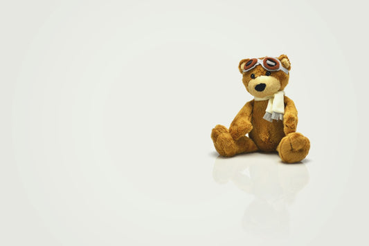 Ours en peluche brun sur fond clair - guide porte-clés peluches 2026 Sivalc